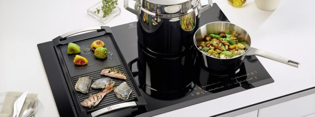 Image pour illustrer es tailles des plaques à induction avec plusieurs feux